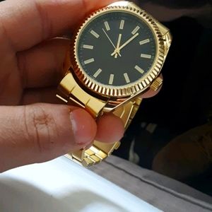 A brand new gold watch